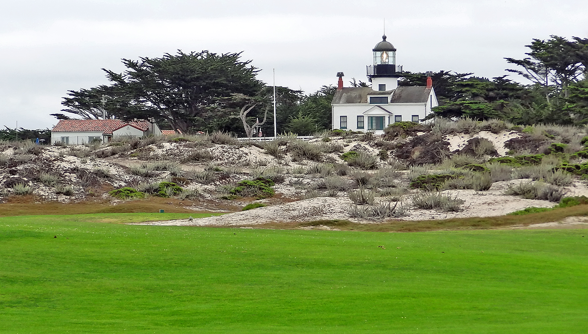 Seaside municipal golf turf beside Point Pinos Lighthouse at Pacific Grove Golf Links, Monterey Peninsula